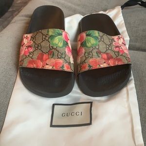 Gucci floral flip flops